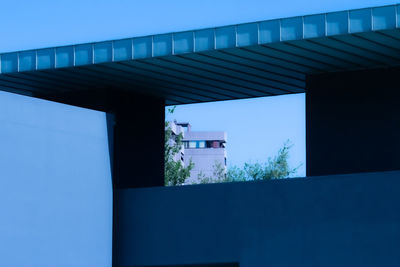 Low angle view of building against clear blue sky