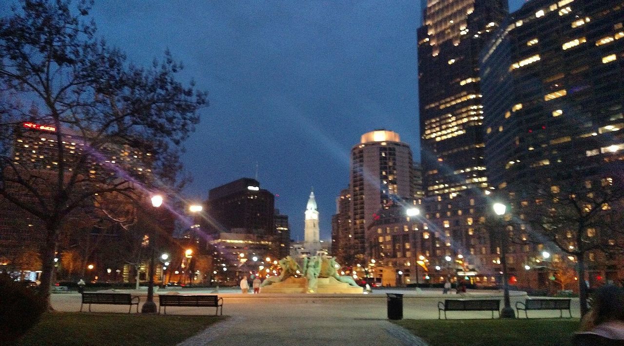 night, illuminated, city, architecture, building exterior, skyscraper, no people, built structure, travel destinations, outdoors, urban skyline, sky, tree, cityscape, city gate