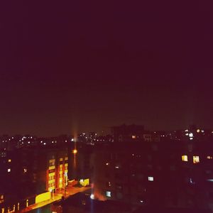 High angle shot of illuminated cityscape at night