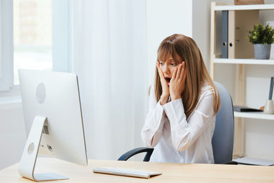 Businesswoman working at office