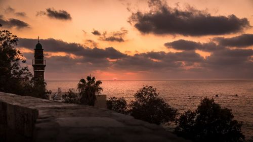 Scenic view of sea at sunset