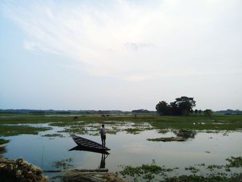 Scenic view of lake against sky