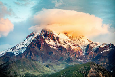 Scenic close up view of kazbek mountain  in georgia at sunrise in summer