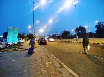 Woman walking on road