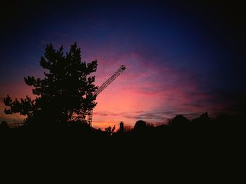 Silhouette tree against sky at sunset