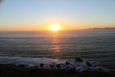 Scenic view of sea against sky during sunset