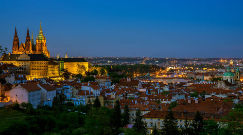 High angle view of illuminated buildings in city