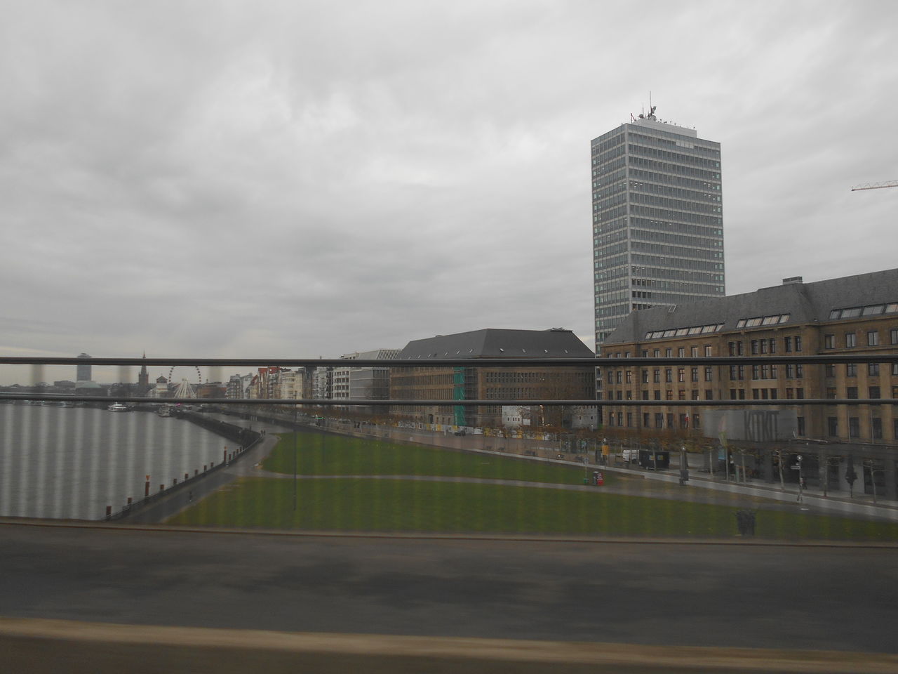 architecture, built structure, building exterior, city, sky, cloud, building, office building exterior, nature, office, travel destinations, urban area, no people, skyscraper, travel, skyline, outdoors, cityscape, transportation, urban skyline, tower block, day, landscape, tourism, overcast, road, sports, city life