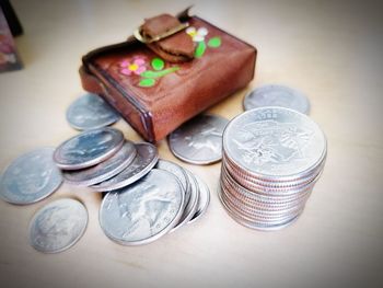 Close-up of coins on table