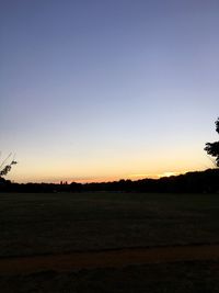 Scenic view of landscape at sunset
