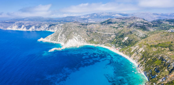 Aerial view of swimming pool by sea against sky