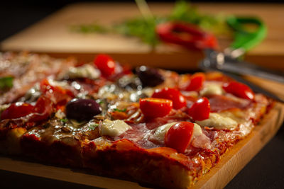 Close-up of pizza served in plate