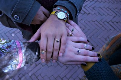 High angle view of couple holding hands