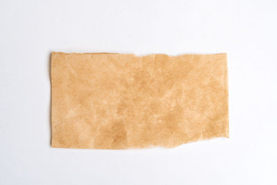 High angle view of paper against white background