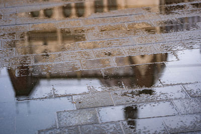 High angle view of wet window during rainy season