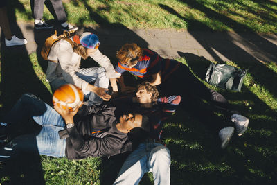 High angle view of people sitting outdoors