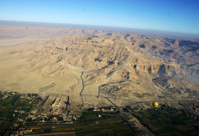 High angle view of field against clear sky