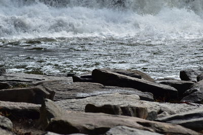 Waves splashing on rocks