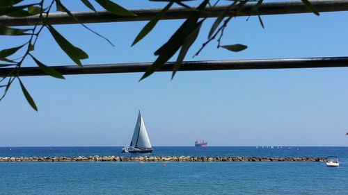 Boat sailing in sea