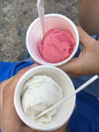 Cropped image of person holding ice cream