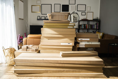 Waste cardboard boxes stack in living room