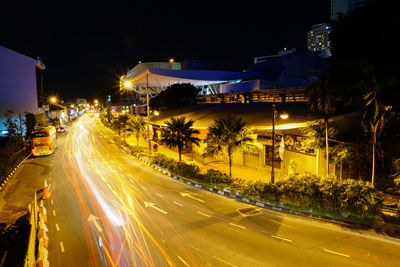 Light trails on city street at night