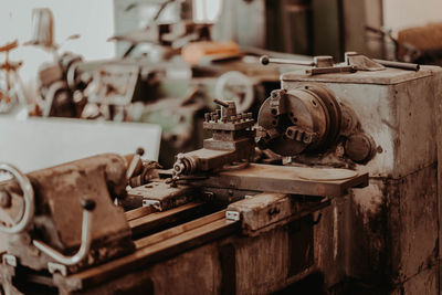 Close-up of old machine part in factory