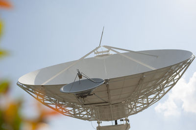 Low angle view of satellite dish against sky