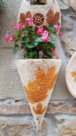 High angle view of potted plant on table against wall