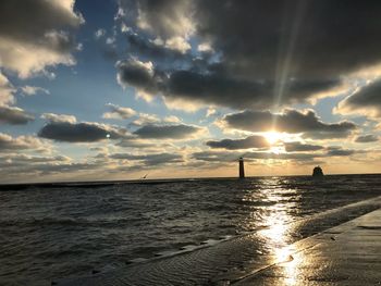 Scenic view of sea against sky during sunset