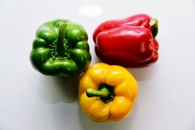 Close-up of bell peppers against white background