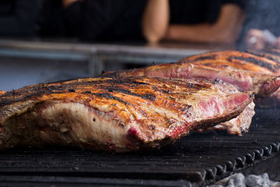 Close-up of meat on barbecue grill