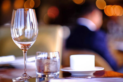 Close-up of wine glass on table in restaurant