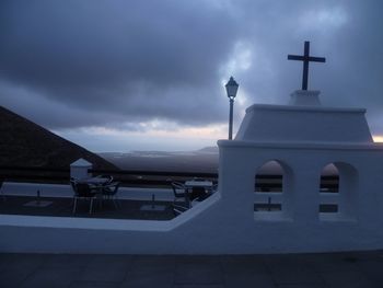 Building against cloudy sky