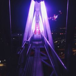 Low angle view of illuminated building at night