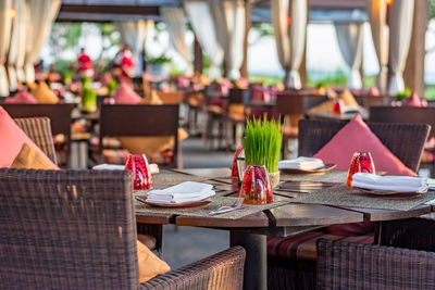 Empty chairs and tables at restaurant