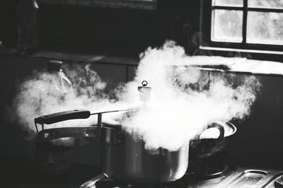 Close-up of steam releasing through pressure cooker