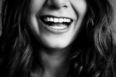 Close-up of beautiful young woman laughing