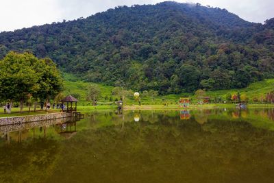 Scenic view of lake against mountain