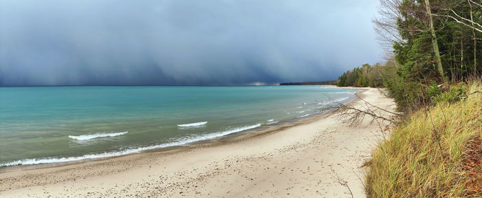 Scenic view of beach against sky