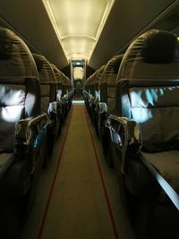 Empty seats in illuminated airplane