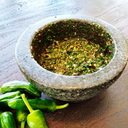 High angle view of chopped vegetables in bowl on table