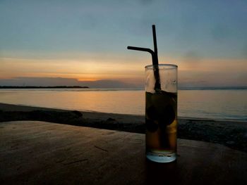 Scenic view of sea at sunset