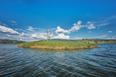 Scenic view of lake against sky