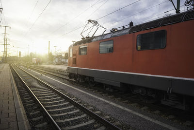 Train on railroad station platform against sky