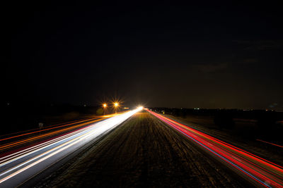 Light trails on road at night