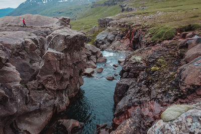 High angle view of rocks in sea