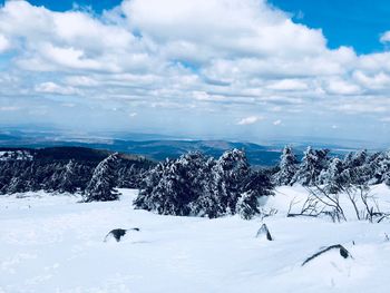 Scenic view of snowcapped mountain against sky