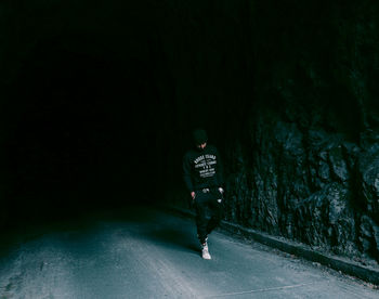 Rear view of a man on road