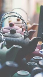 Close-up of teapots and bowls